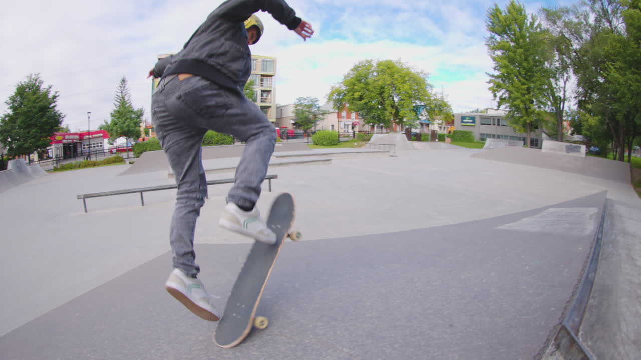 Skateboarder slow motion 360 flip on jump