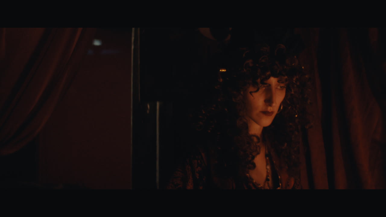 A gypsy lady shuffles the tarrot cards