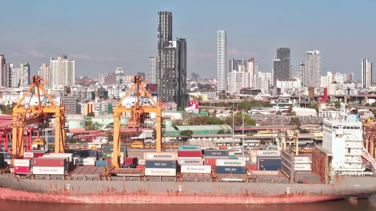 View of Bangkok's shipping port with skyline in the background