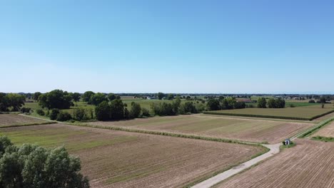 drone flies over fields of the po valley