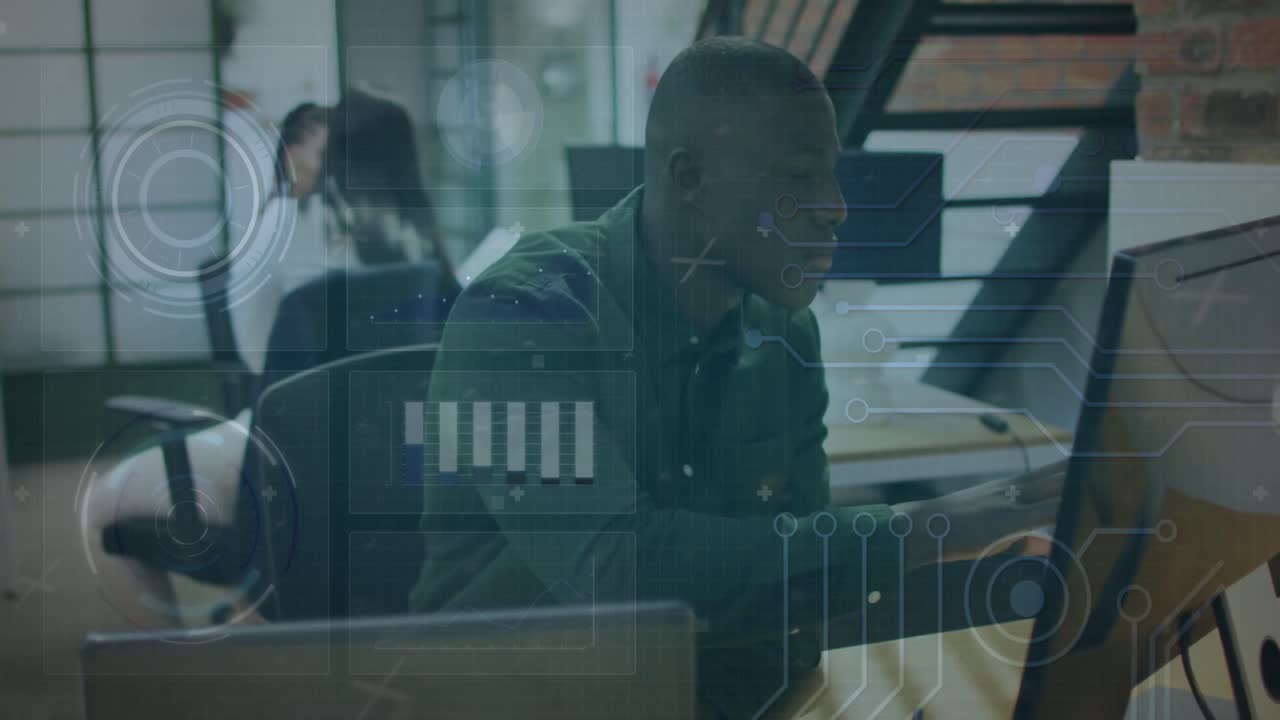 Animation of data processing over african american businessman using computer