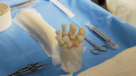 operating room table with implanters, scissors and marker for hair transplant