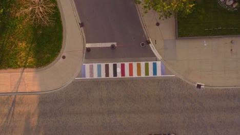 aerial view of a pride sidewalk  freshly painted