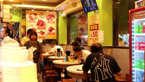 diners enjoying meals in a bustling eatery