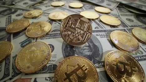 gold bit coin btc coins and dollar bills.