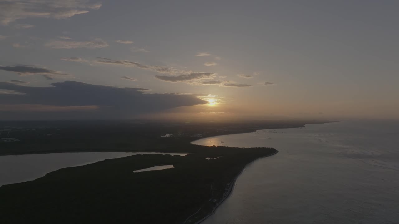 Aerial View of Sunset Over Tropical Coastline