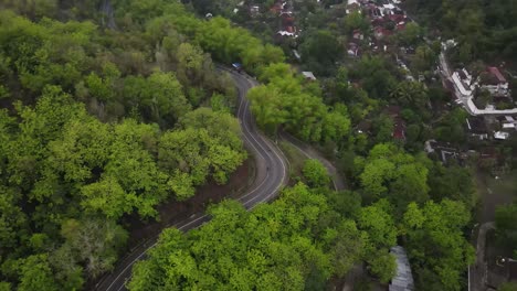 Aerial-view,-winding-road-to-Mangunan-peak-tourist-attraction