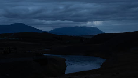 moving clouds over river bank, time lapse