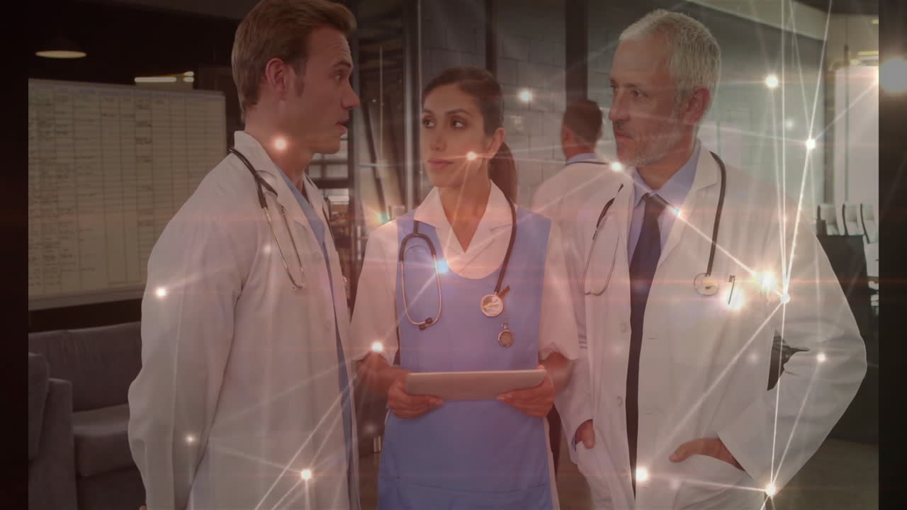 Discussing patient data, doctors in hospital with network connections overlay