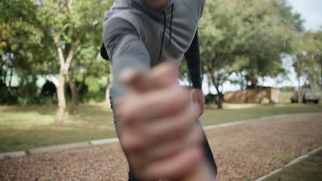 hands, fitness and face of a man in a park