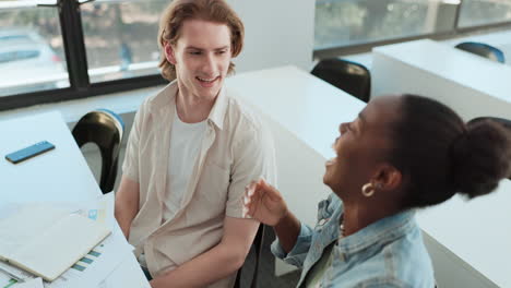 students engaging in a lively discussion in a classroom