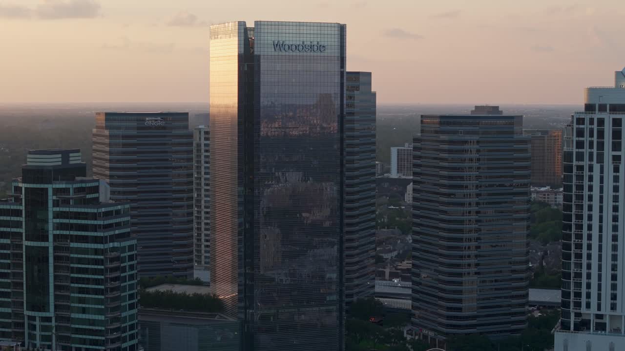 Skyscrapers at sunset, Uptown district Houston Texas, Telephoto drone establishing shot