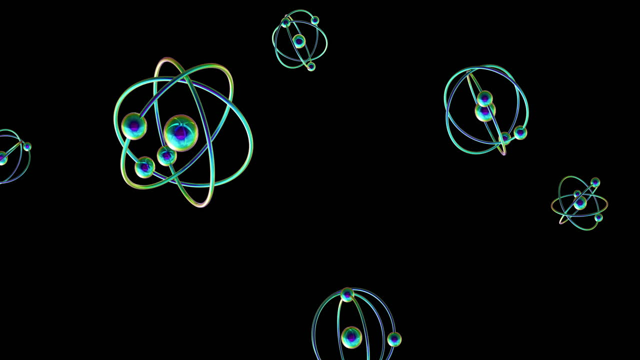 Animation of atom models spinning on black background