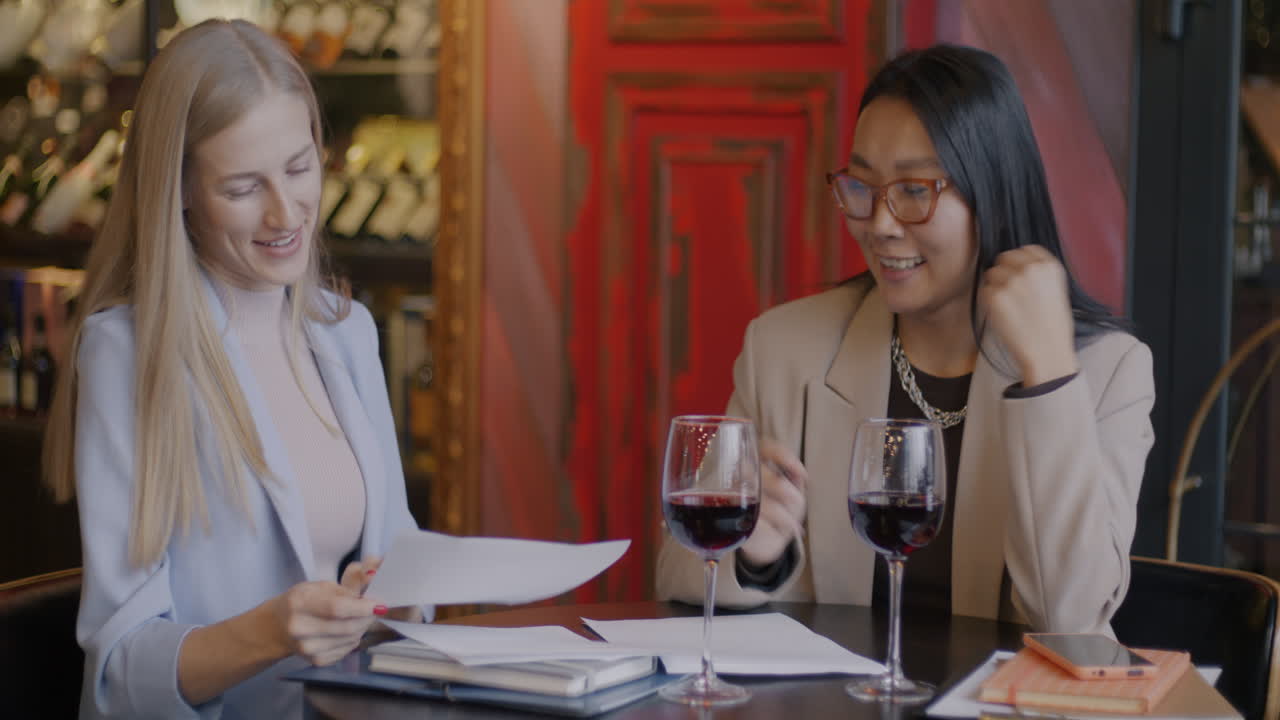 Businesswomen Meeting in Coffee Shop