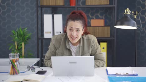 Cheerful-and-caring-business-woman-looking-at-camera.