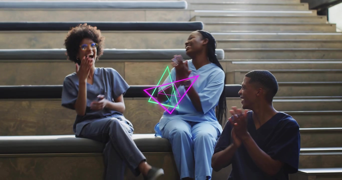 Host calling colleague at microphone while medical staff applauding nurse accepting glass trophy