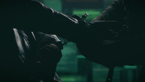 silhouetted hands in a dark, mysterious encounter