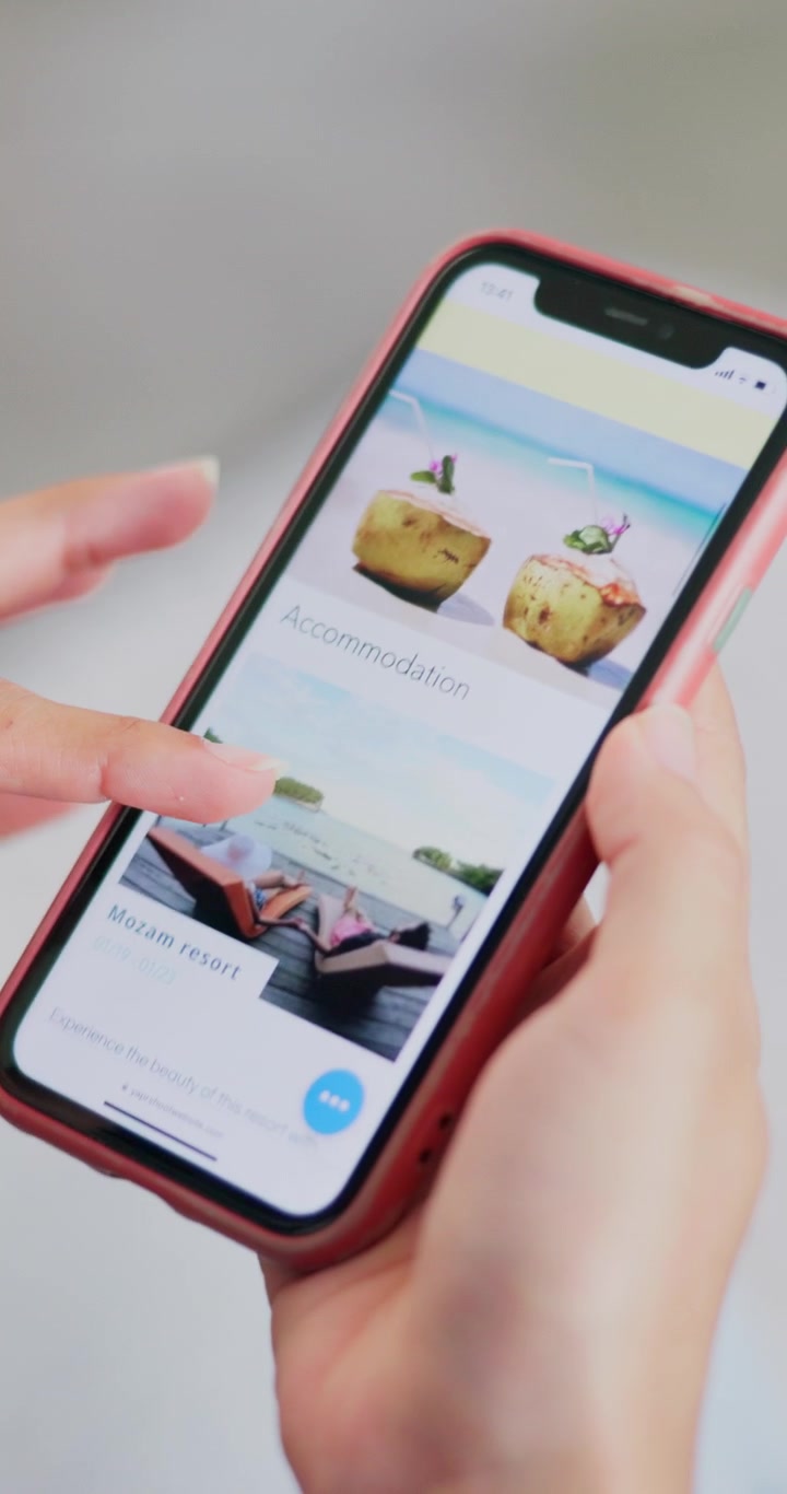 Person Browsing Travel Accommodation Website on Smartphone