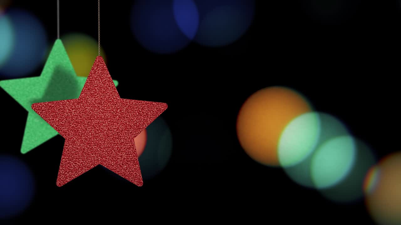 los adornos de las estrellas de navidad se mueven en el fondo de bokeh.