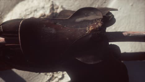 Rider-Leather-Saddle-on-fence-in-desert