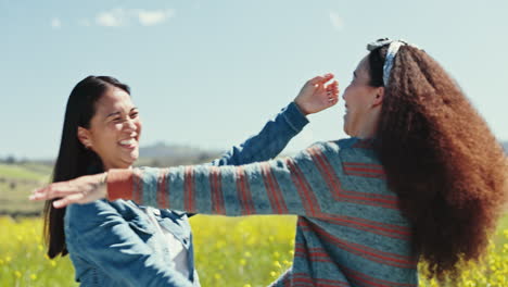 lesbian couple, happy and women hug at field