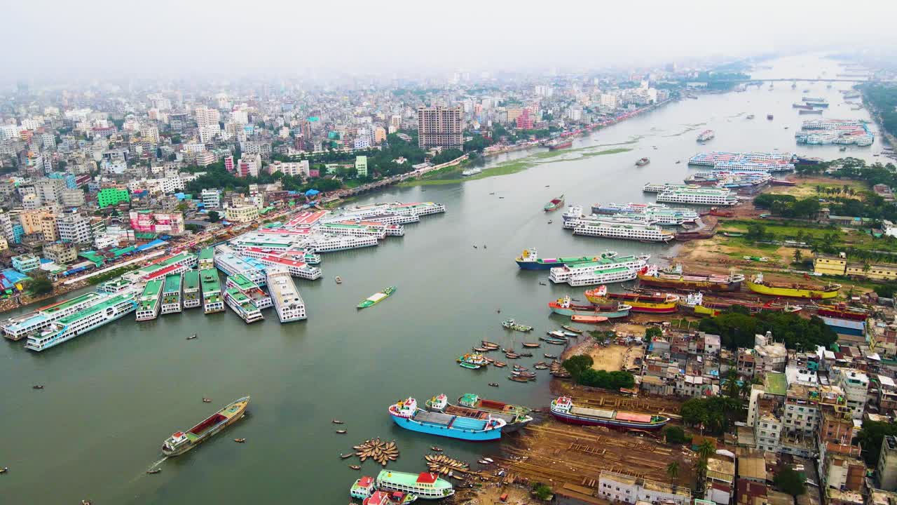 Aerial: Keraniganj shipbuilding dockyard on Buriganga river port, Bangladesh