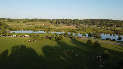 fly over shot of a football practice in liberty park clarksville tennessee during the day