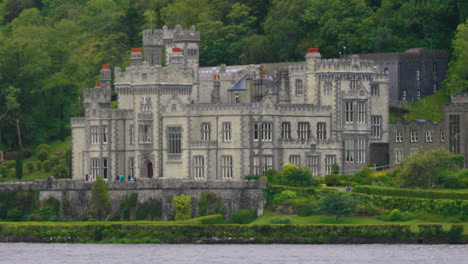 kylemore abbey monastery overlooking pollacapall lough in county galway, ireland