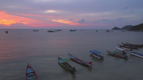 beautiful sunset over the sea with boats