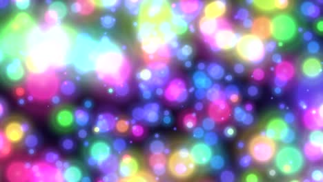 volar brillos de arco iris y bokeh redondo en el espacio oscuro