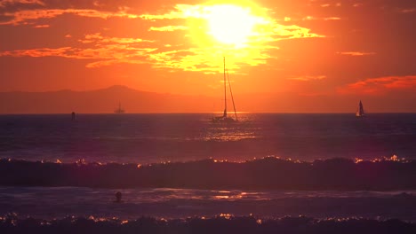 waves break in front of a beautiful and inspirational southern california sunset 1