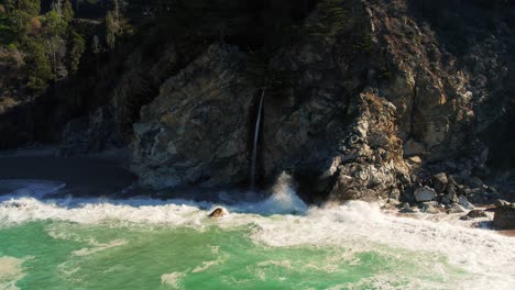 Drone-shot-of-McWay-Falls-Waterfall-on-Scenic-Coastline-at-Big-Sur-State-park-off-Pacific-Coast-Highway-in-California-5