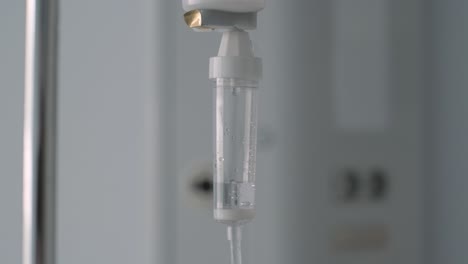 handheld motion intravenous drip equipment, medical treatment concept - close up