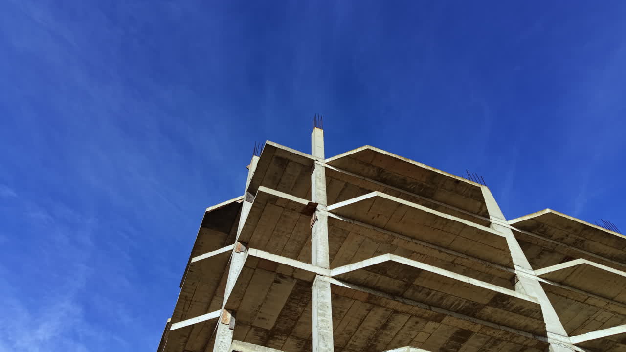 Urban structure under a clear blue sky showcases the beauty of industrial design and architectural elegance during the afternoon light