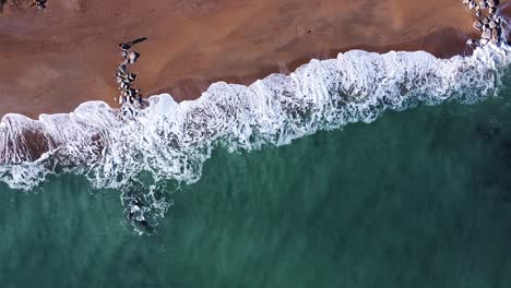 aerial view of an italian coastline, morning light, bird's-eye view of sea waves