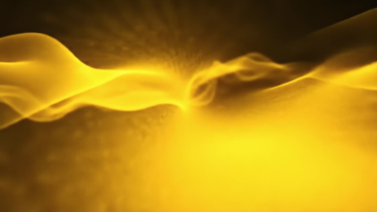 Lovely golden patterns swirl and flow together in a mesmerizing abstract display. The dynamic movement creates a captivating visual experience filled with elegance and charm.