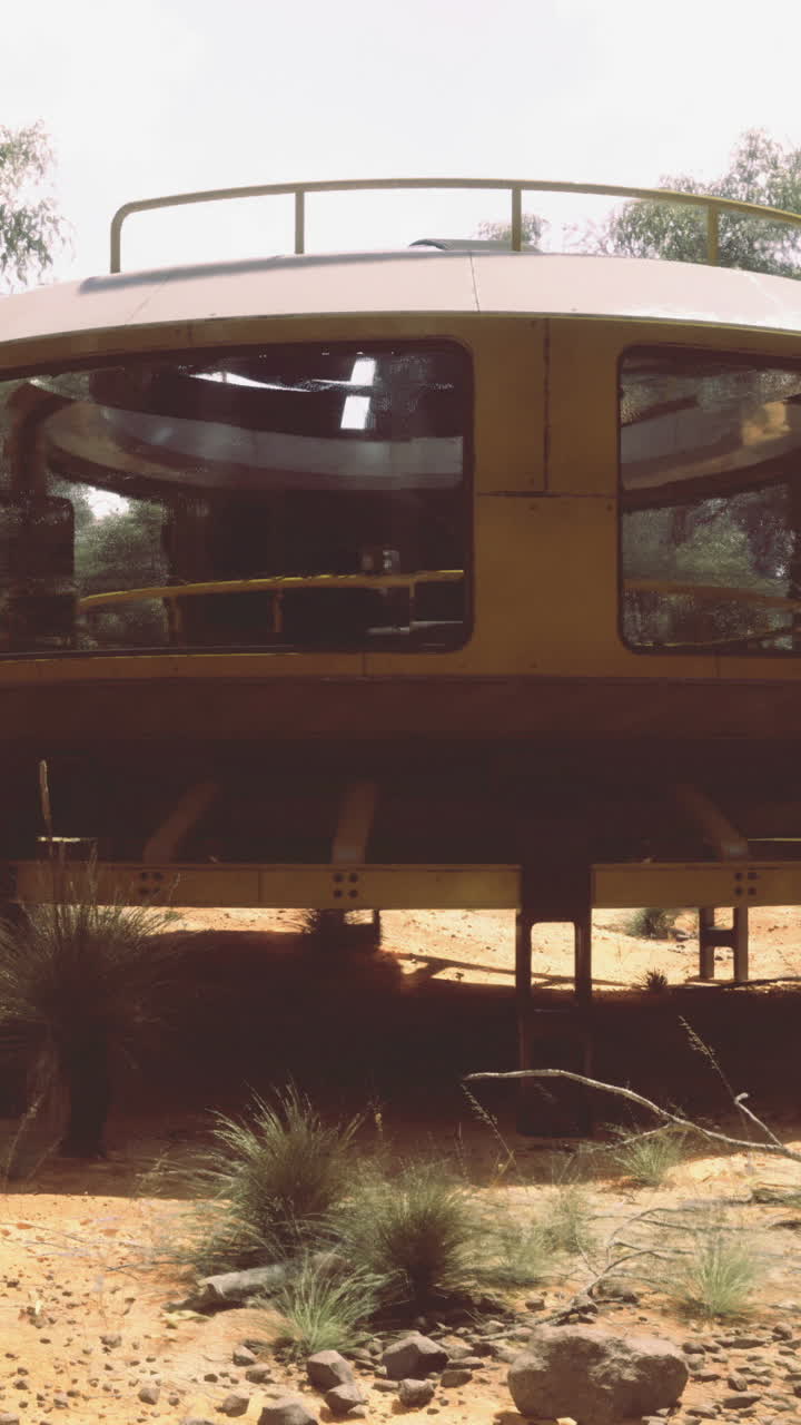 Unique futuristic structure in remote australian landscape with greenery