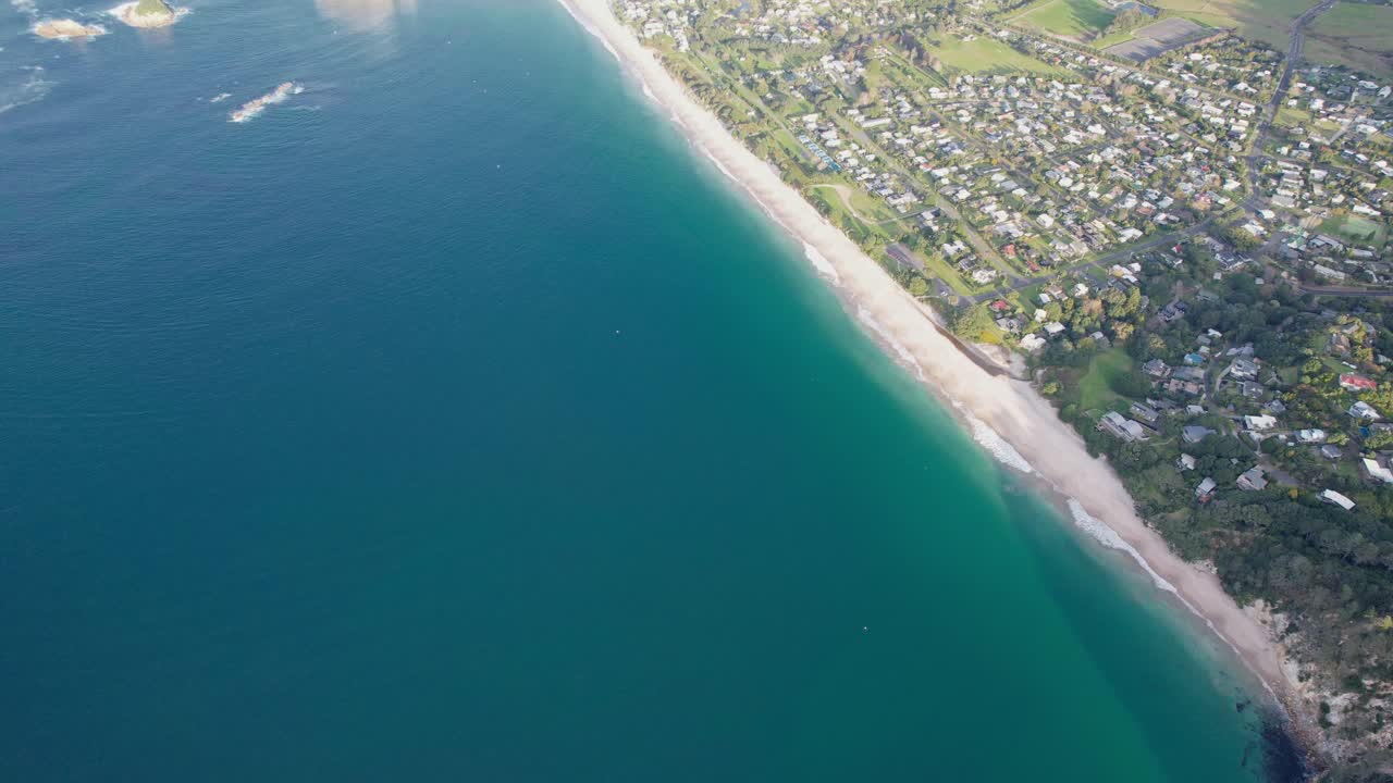 Aerial View of Coastal Town and Beach