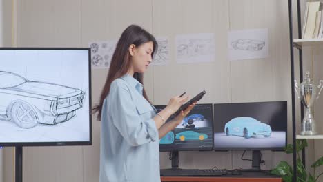 female designer working on car design project