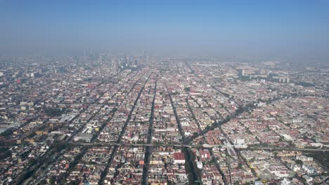 drone shot of east mexico city duing a very polluted day