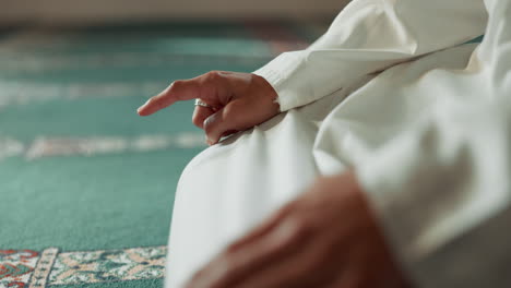 islam, prayer and closeup of a pointing finger