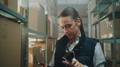 warehouse worker scanning packages