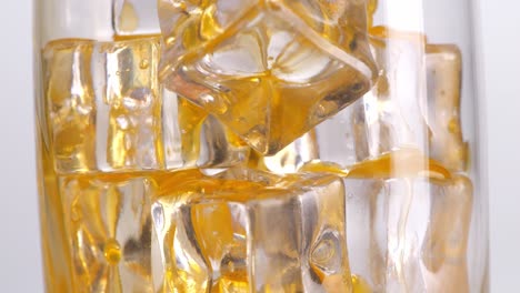 close-up of orange juice with ice