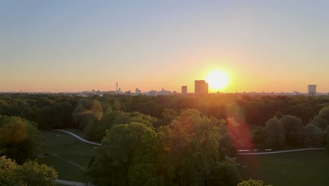 fly up at munich english garden with munich skyline