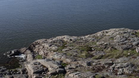 Drone-footage-of-coastal-rocks-in-water-in-Aröd-on-the-Swedish-west-coast