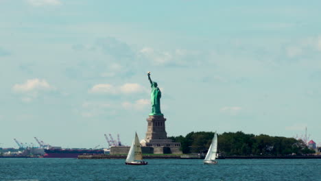 sail boats liberty statue new york city summer