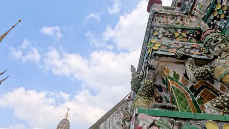 close-up views of ornate wat arun temple architecture in bangkok