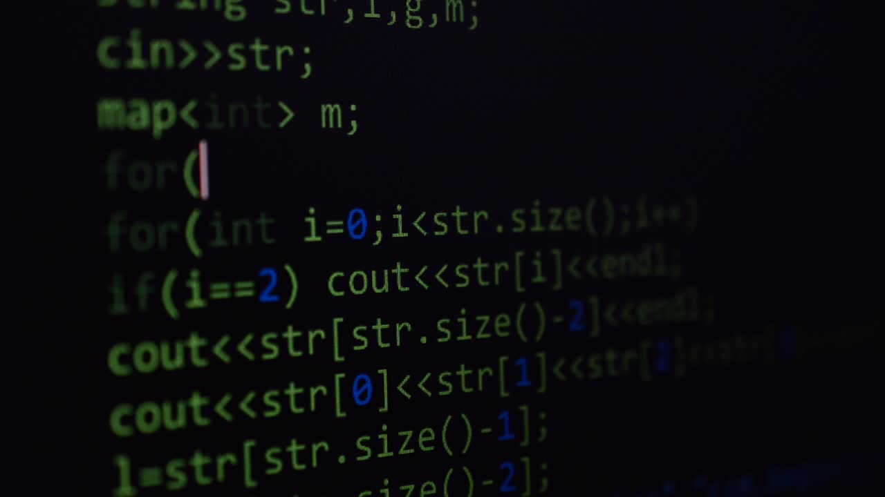 Source code on the monitor screen. Source code