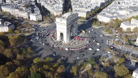 drone view of the magnificent arc de triomphe on a sunny day.