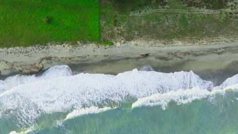 rough france ocean with beach nature background overhead vertical relaxing